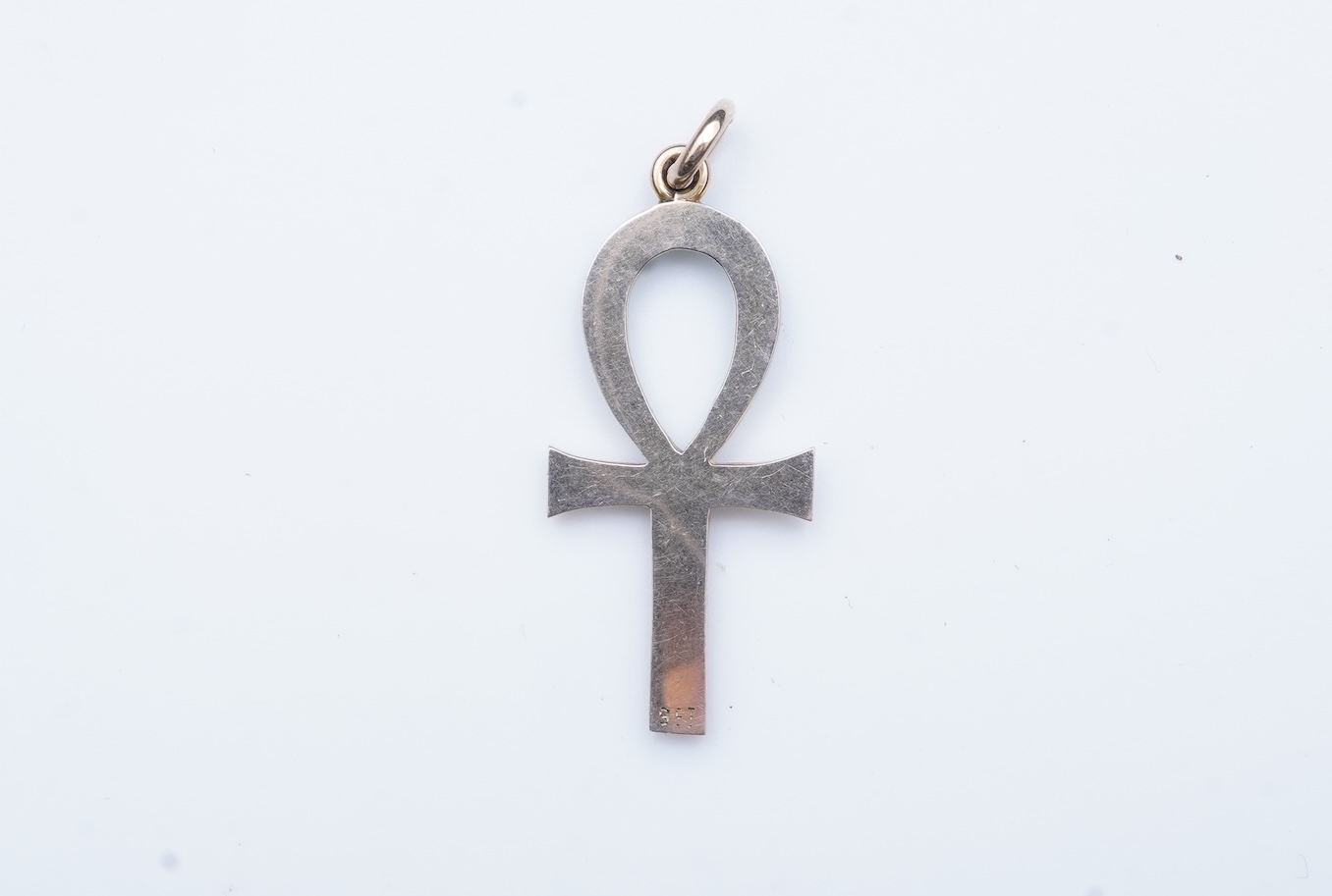 An Edwardian Egyptian revival turquoise and pearl pendant, early 20th century
